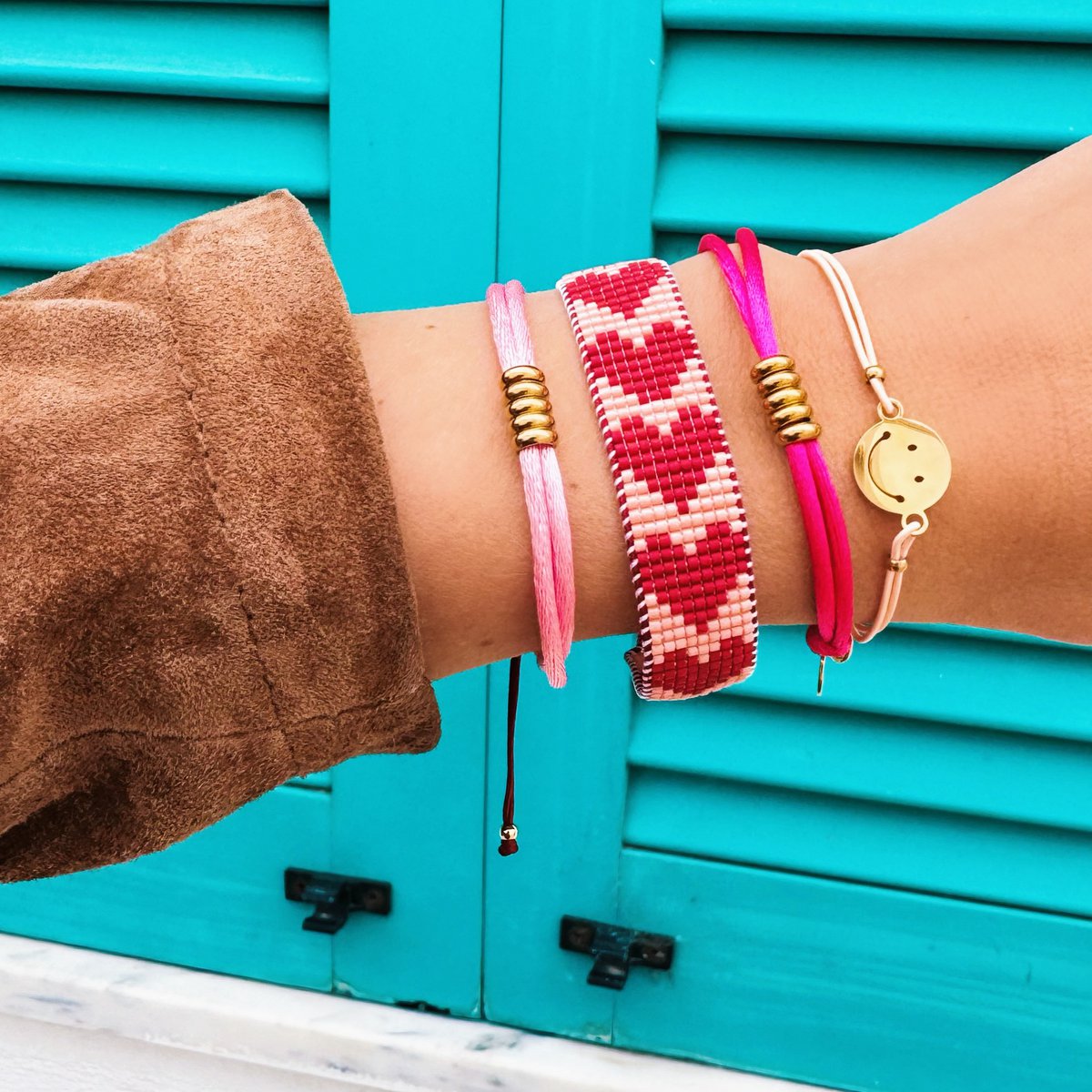 Elastisches Armband mit Smiley - Rosa