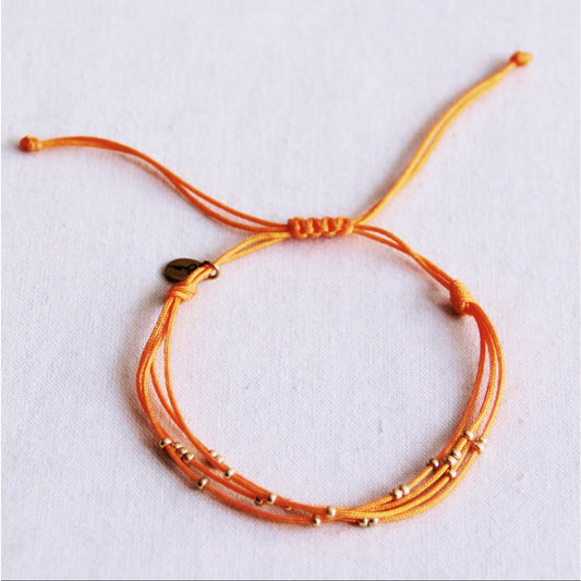 Vierfach-Satinarmband mit Perlen - Orange