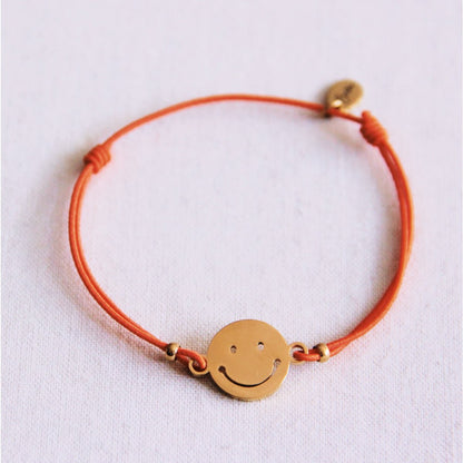 Elastisches Armband mit Smiley - Orange