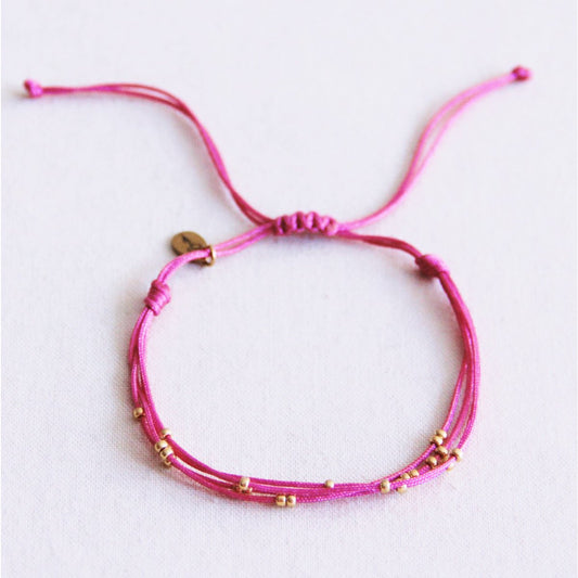 Vierfach-Satinarmband mit Perlen - Pink